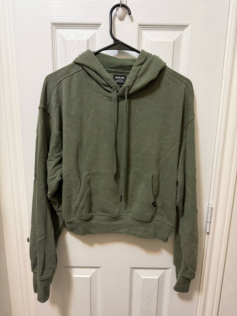 Green cropped Prana hoodie made from hemp